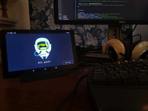 picture of small Android display running the info-radiator on a desk